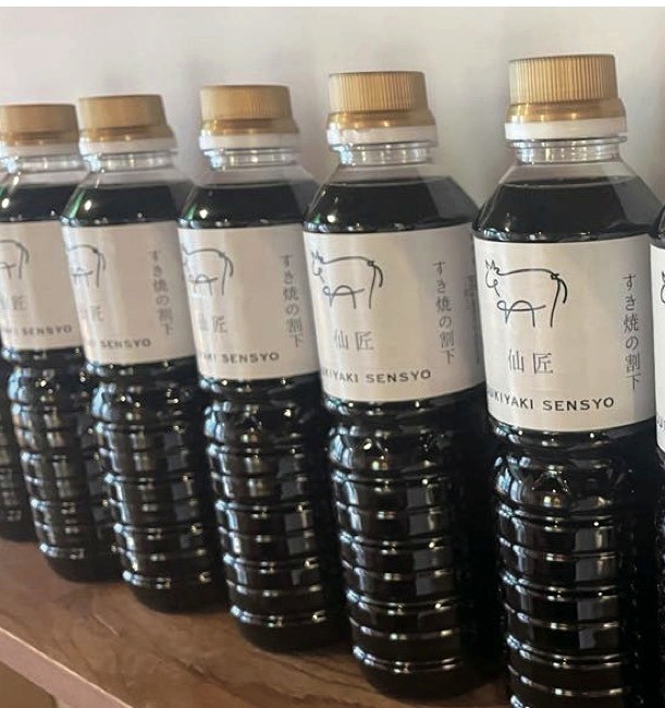 Retail-ready SENSYO sukiyaki sauce bottles on the shelf